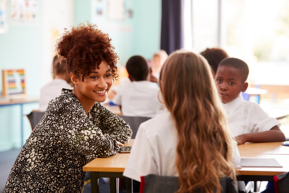 Teacher with students