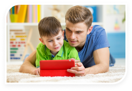 father and kid reading